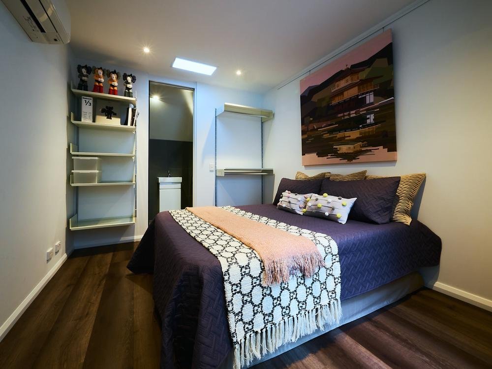 Bedroom opening to balcony and custom stairs